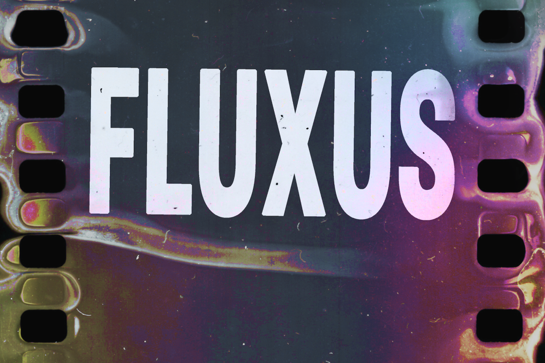 "FLUXUS" in large, bold white text, on top of a distorted 35mm film that's been bent and manipulated. The film is a gradient of orange, pink, dark green and maroon.